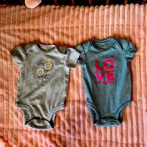Carter’s 0-3 mo pair of graphic onesies